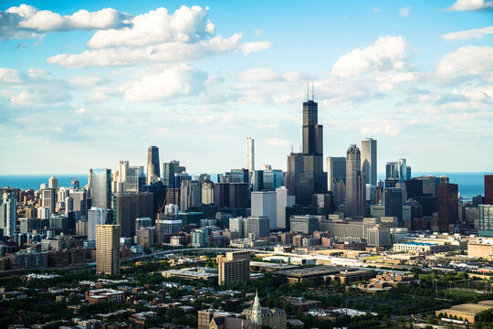 downtown chicago skyline during the day from a helicopter © Aon Prestige Media
