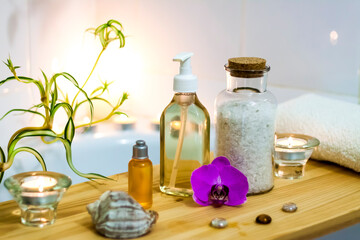 Fototapeta na wymiar Spa-beauty salon, wellness center. Spa treatment aromatherapy for a woman's body in the bathroom with candles, oils and salt.