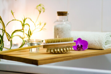 Spa-beauty salon, wellness center. Spa treatment aromatherapy for a woman's body in the bathroom with candles, oils and salt.