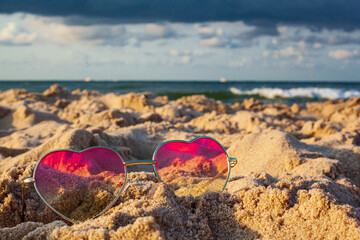 Glasses in the sand