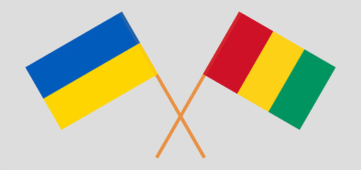 Crossed flags of Ukraine and Guinea. Official colors. Correct proportion