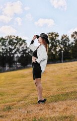 Young beautiful woman on lawn