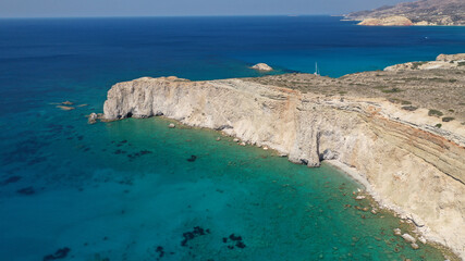 Fototapeta premium Aerial drone photo of beautiful volcanic emerald paradise bay below white rock with perlite mine, Milos island, Cyclades, Greece