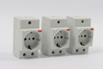 Electrical socket for installation on a din rail on electrical panel. 