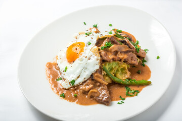 Veal with parsnip puree, asparagus, egg and miso mushroom sauce 