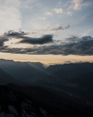 Clouds in a sunset above mountains