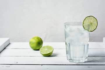 Cold lime drink with ice.