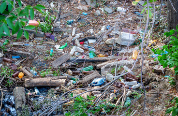 Environmental pollution plastic, glass and metal waste.