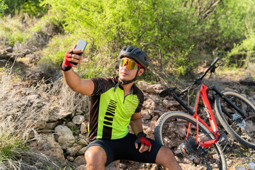 Cyclist posting a selfie on his social media