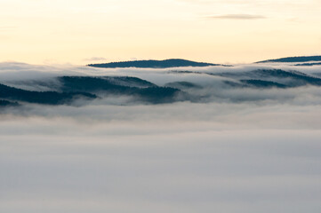 Fototapeta na wymiar Solińskie Lake bathed in morning fog, Solina, Bieszczady, sunrise