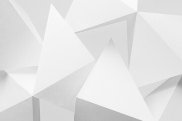 White triangular shapes made paper, abstract background