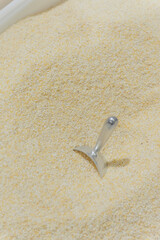 Close up of grits inside of a milling station