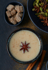 masala tea on wooden surface