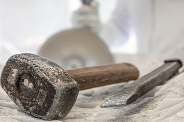 The sculptor's tools: hammer and chisel