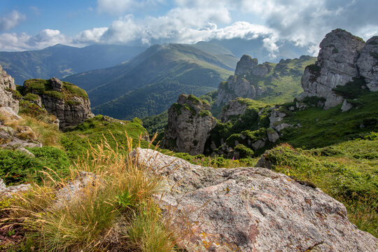 Landscape of Babin zub peak on Stara planina (Balkan mountains) in summer time. Track to highest point Midzor in Serbia in background