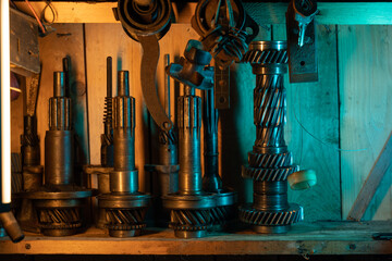 A lot of old rusty instruments in vintage dirty garage.