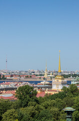 Fototapeta premium panoramic top view of the historical center of the city and the high spire of the Admiralty on a sunny summer day and a space for copying in Saint-Petersburg