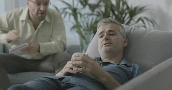 Bored therapist mocking his patient