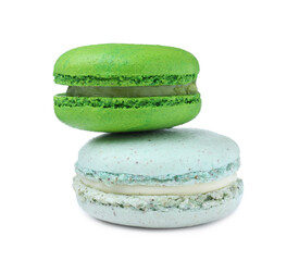 Different delicious colorful macarons on white background