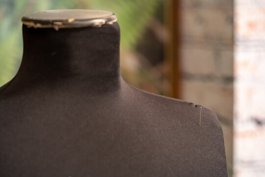 Closeup Shot Of A Black Mannequin Upper Part For Clothes