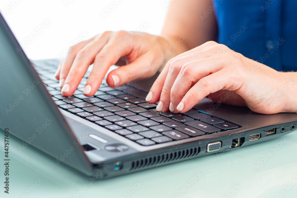 Poster hands are typing. woman's hands on keyboard. girl is typing something. gain text on keyboard compute