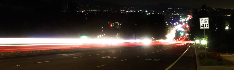 Night Road in a Small Town With the lights leaving a motion streak on a slow shutter