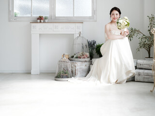 Fototapeta na wymiar ウェディングドレスを着た花嫁　ブライダルイメージ