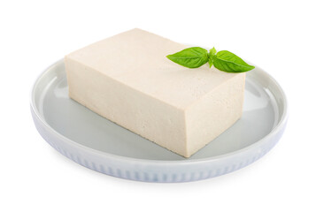 Plate with delicious raw tofu and basil isolated on white