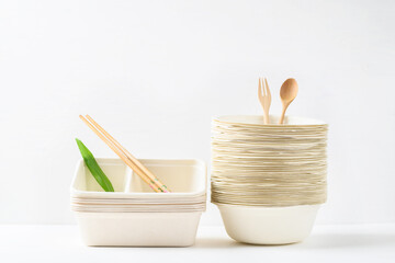 Fototapeta na wymiar Biodegradable bowl made from natural fiber with chopsticks on white background, Eco friendly and sustainability concept