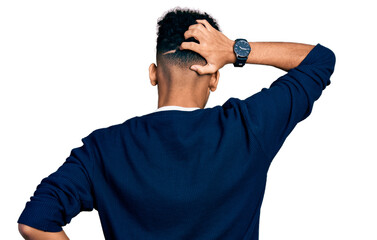 Young african american man wearing casual clothes backwards thinking about doubt with hand on head