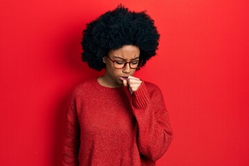 Fototapeta na wymiar Young african american woman wearing casual clothes and glasses feeling unwell and coughing as symptom for cold or bronchitis. health care concept.