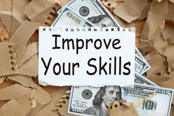 Improve Your Skills, text on white paper on torn kraft paper background. and dolar
