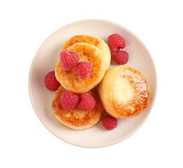 Delicious cottage cheese pancakes with raspberries on white background, top view