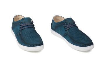 A large number of jasmine flowers and a glass teapot with flower tea on a wooden table.