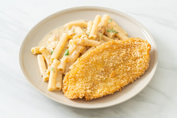 quadrotto penne pasta white cream sauce with fried fish