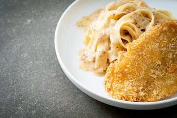 fettuccine pasta white cream sauce with fried fish