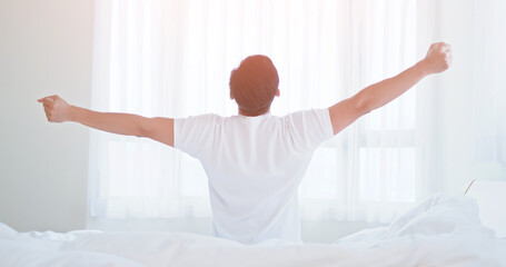 asian man stretch his body