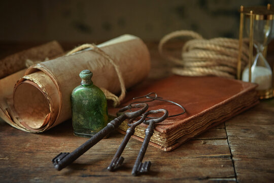 An atmospheric still life with ancient objects of a natural scientist or a scientific researcher