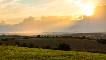 Sun ray light with a beautiful Rural summer landscape in France