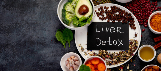 Best products for healthy liver on dark gray background. Clean eating concept.