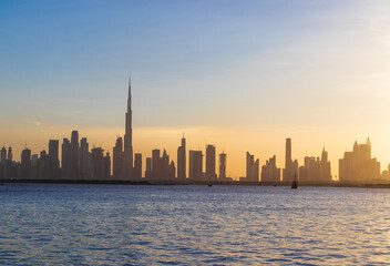 Fototapeta na wymiar Dubai, UAE - 07.17.2021 View of Dubai skyline, shot made from Dubai creek harbor. Landscape
