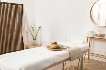 Vlies Fototapete Schönheitssalon Stylish room interior with massage table in spa salon