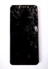Broken Smartphone with a smashed screen on a white background