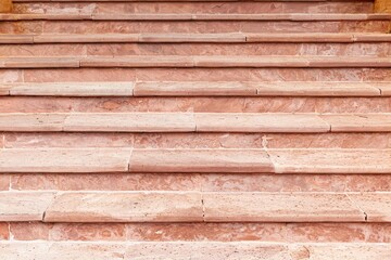 Building exterior stairs with antique red brown granite tiles