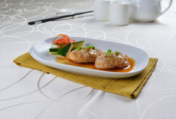 braised cook scallop with cuttlefish prawn paste ball seafood in oyster sauce in white background asian halal menu