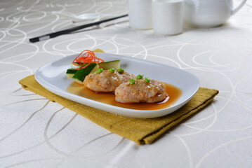 braised cook scallop with cuttlefish prawn paste ball seafood in oyster sauce in white background asian halal menu