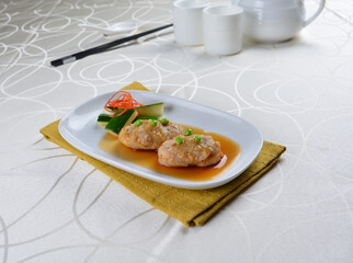 braised cook scallop with cuttlefish prawn paste ball seafood in oyster sauce in white background asian halal menu