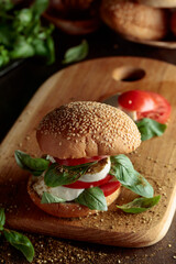 Sandwich with mozzarella, tomatoes, and basil.