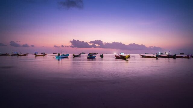 Time lapse of Beautiful sunset and Long tail boat at Koh tao island,Thailand.