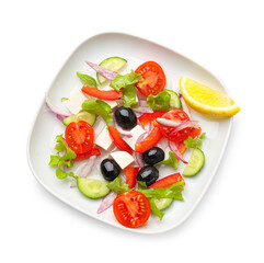 Plate with tasty Greek salad on white background